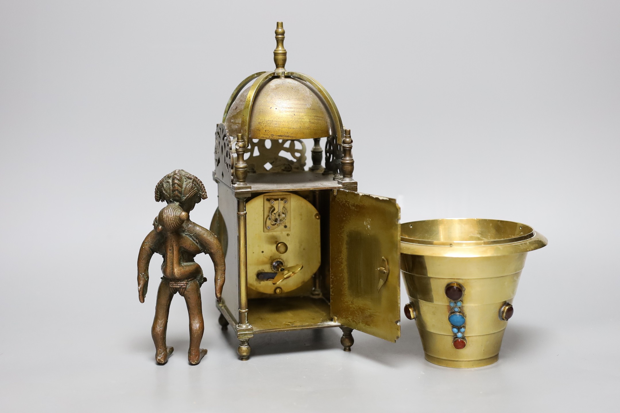 A cabochon-set pail, a 20th century lantern clock and an African cast metal figure